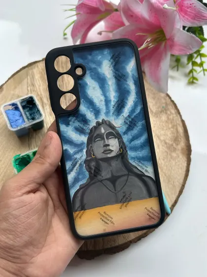 This is a custom phone cover I made for a client, featuring the Adiyogi statue. I used gouache to create the swirling blue energy of the sky behind him.