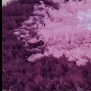 The rich texture of ombre purple ruffles. This fabric detail shot gives you a sense of the quality and artistry that goes into each gown in my collection.