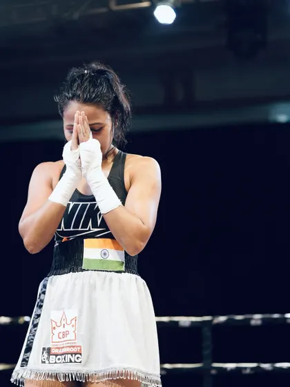A moment of gratitude and belief before a fight.