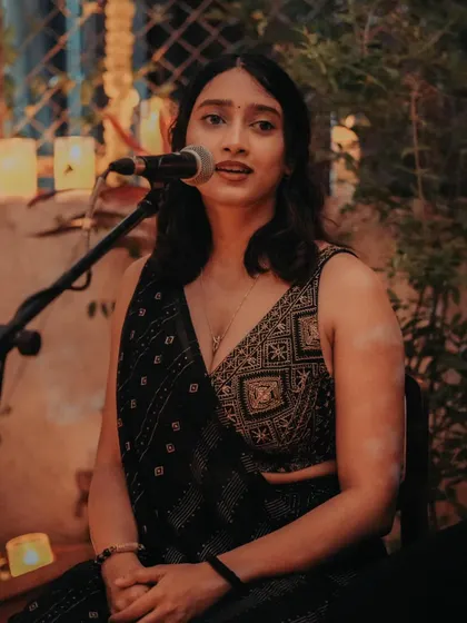 Guest vocalist @neha.rd_ joins our Diwali set, sharing songs in an intimate, seated performance.