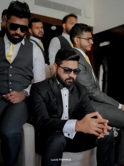 The groom and his groomsmen, looking cool and ready for the big day.