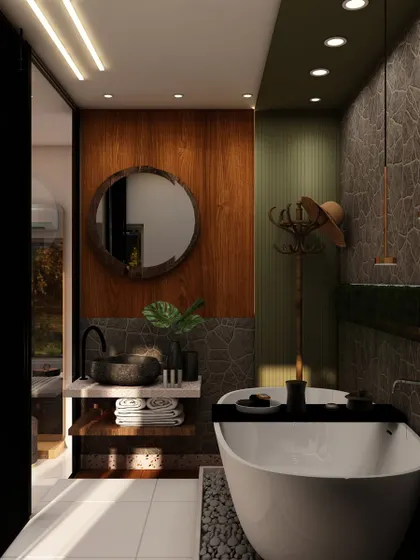 A close-up of the attached bathroom from image 72, showcasing a freestanding bathtub, stone-textured walls, and warm wood accents for a spa-like feel.