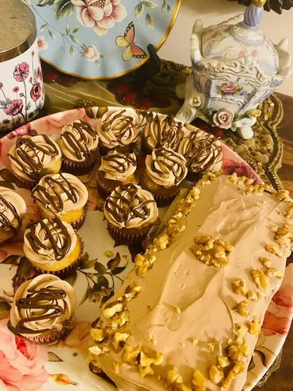 A beautiful dessert platter featuring my ultra moist banana cupcakes with Nutella cream frosting and a banana walnut Nutella swirl tea cake.
