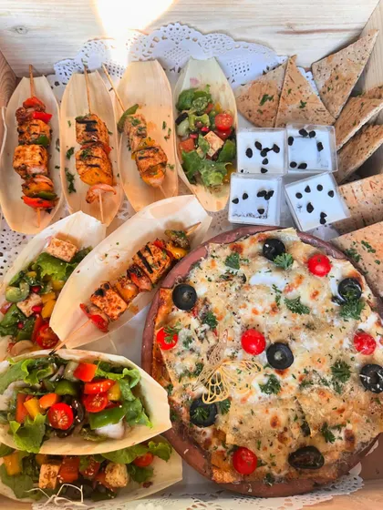 My Italiano Platter box, featuring baked ricotta lasagne, paprika cottage cheese skewers, Greek feta salad, pizza crisps, and a sweet vanilla tiramisu.
