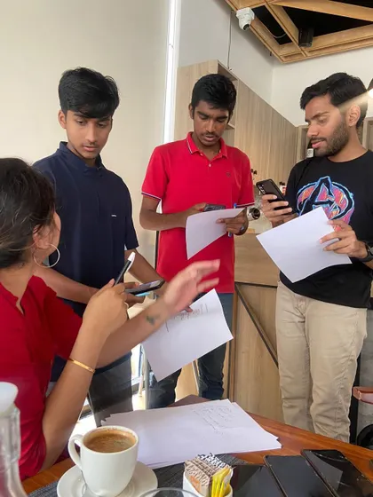 Students collaborating during an off site activity. Group work and peer to peer interaction are essential components of our teaching philosophy, encouraging teamwork and communication.