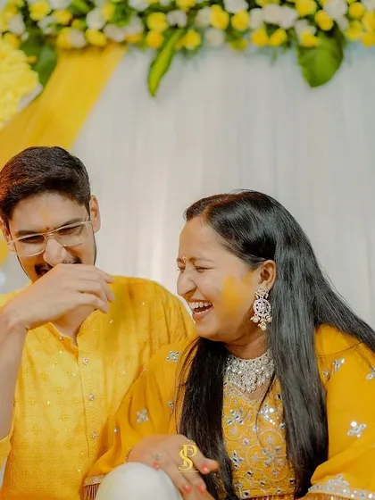 A playful and happy moment between the couple during their Haldi. These lighthearted interactions make for wonderful, authentic photos.