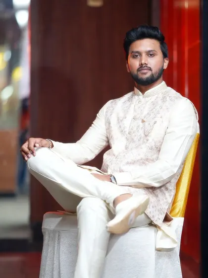 A portrait of me in traditional attire. I am comfortable and experienced in performing at a wide variety of events, including cultural celebrations and formal galas where a specific dress code adds to the elegance of the occasion.
