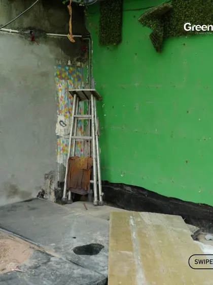 The "before" shot of a terrace jacuzzi area. This image shows the cluttered and unfinished space before we began our work to turn it into a luxurious retreat.