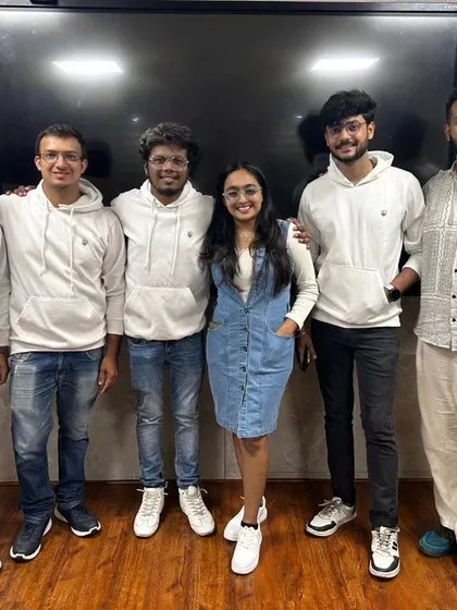 The band in matching hoodies after the RVITM show.