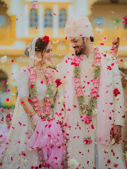 The pure, unfiltered joy of a wedding. This moment, with the couple showered in petals, is what I live to capture. It’s not just a photo; it’s the feeling of celebration frozen in time.