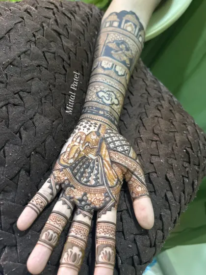 A single hand view of a bridal design, focusing on the groom's portrait. The use of negative space makes the figure stand out beautifully.