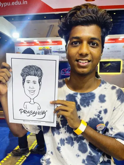 A young student from an education fair, happy with his caricature. It's a fun way to engage with kids at any event.