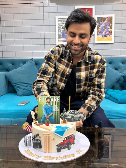 Another happy shot of Jitendra Kumar with his custom birthday cake.