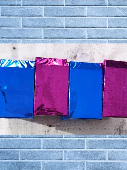 The wallets are packaged in shiny, colorful foil bags, making them an exciting little present to open.