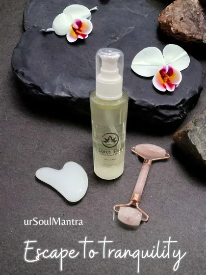Escape to tranquility with my mindful skincare tools. Here you can see the Lotus Bliss oil paired with the white gua sha and rose quartz facial roller, a perfect combination to soothe skin, reduce puffiness, and promote a natural glow.