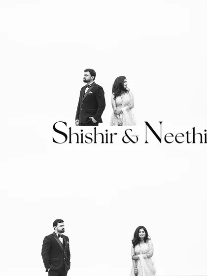 A clean and modern black and white graphic featuring the couple's names. This minimalist style is perfect for save-the-dates or a contemporary wedding album.