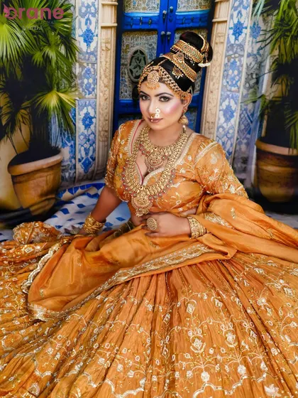 The full seated portrait, showcasing a complete look that is ready for a professional bridal portfolio.