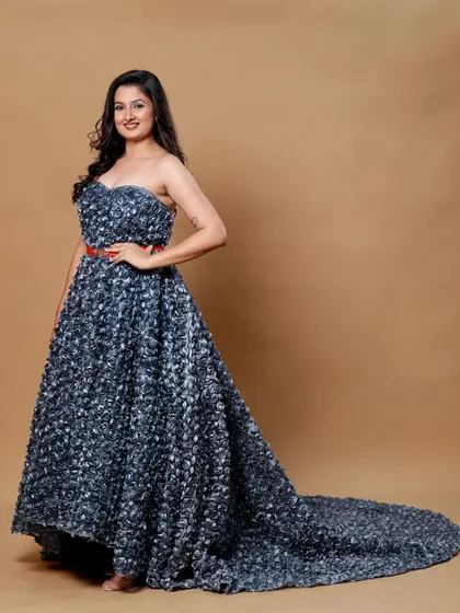 A classic full-length portrait pose in the grey floral gown with its impressive tail.