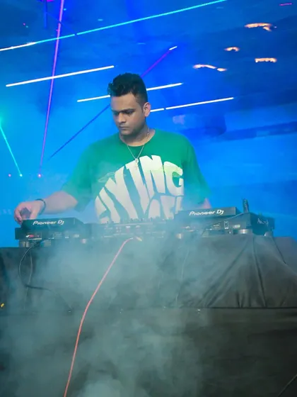 Surrounded by smoke and lasers, focused on the decks. I am comfortable and experienced in full production environments.