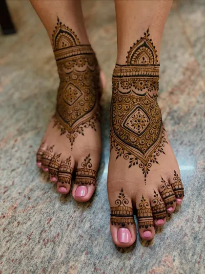 A straight-on view of the geometric feet design, highlighting its symmetry and clean lines.