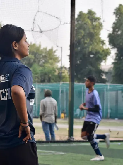 One of my female coaches observing players during a trial. I am proud to have a diverse and expert coaching team that provides guidance and mentorship to all aspiring footballers.