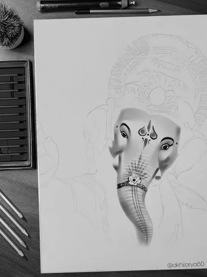A work-in-progress shot of a Ganapati Bappa drawing. Here, you can see the face and trunk are partially shaded, showing how the image emerges from the paper.