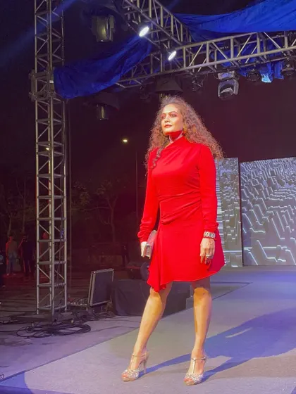Striking a pose on the ramp. The right posture and confident stance are just as important as the clothes you wear, a principle I teach in all my coaching sessions.