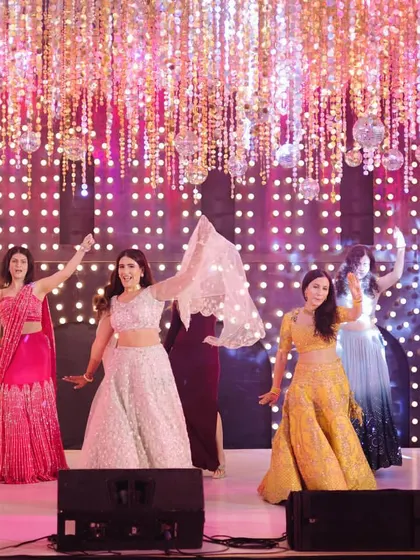 Another look at a fantastic bridesmaids' performance. Notice how the different colored outfits pop on stage; I can help provide input on formations that make your group's styling look its best.
