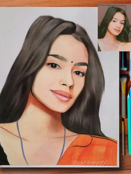 This A4 colored pencil portrait has a soft, beautiful quality. I focused on her expressive eyes and the gentle colors of her outfit.