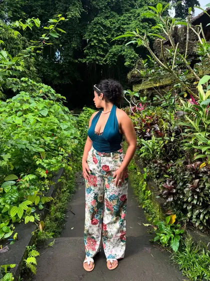A full-length shot of my jungle explorer outfit. The wide-leg pants are super comfortable for walking around, and the halter top keeps it cool.