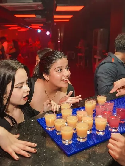The bar is a great place to grab a drink and enjoy the party. The ladies' night specials are always a hit.
