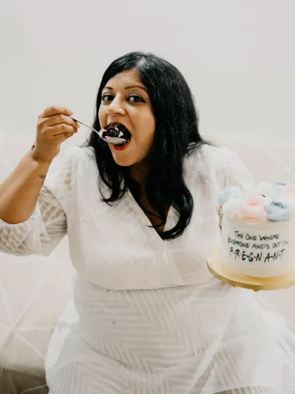 Of course, the baker has to eat the announcement cake! Enjoying a slice of my own special creation.