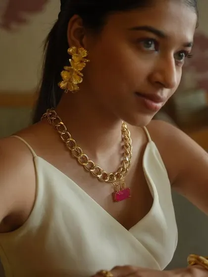 Statement earrings, because ordinary is never an option. This model looks stunning in my multi-oval statement earrings and a chunky gold necklace.