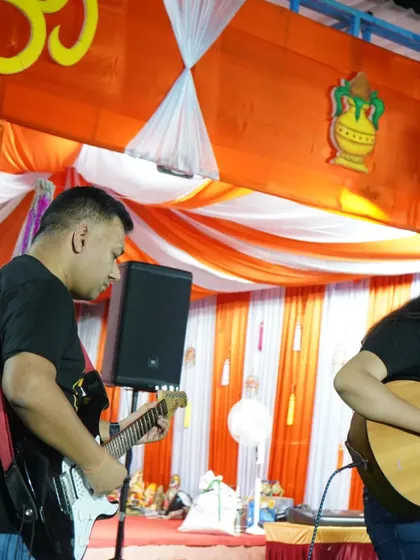 Mentor and student sharing the stage. It's a joy to perform alongside the talented musicians we are nurturing in our club.