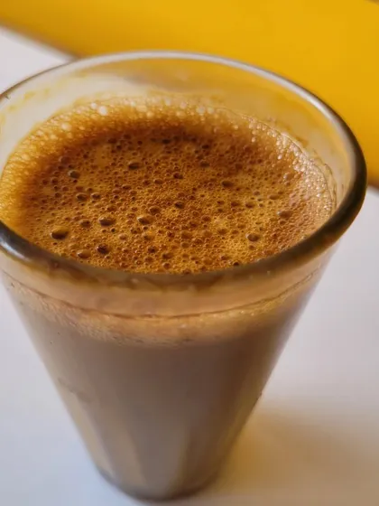A close-up of our authentic filter coffee, shared by a customer. You can see the rich color and frothy top, a sign of a perfectly brewed cup.