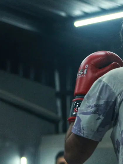 Two fighters face off, the tension and focus palpable. This is what our training environment is all about.