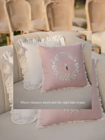 The details mattered deeply. For the wedding ceremony, I chose these elegant cushions with a delicate bee embroidery, adding a touch of playful sophistication to the pastel-themed seating.