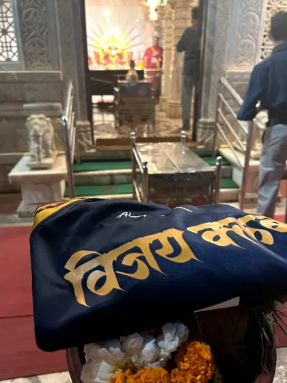 Our jersey outside the temple, ready for a new season of challenges.