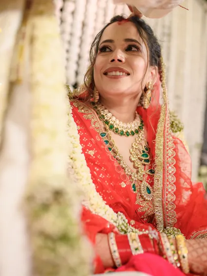 Less is more when grace speaks louder than glam. This bride's soft, subtle look features fresh, glowing skin, softly defined eyes, and nude brown lips.