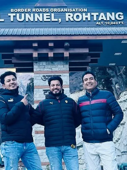 At the entrance of the Atal Tunnel in Rohtang. Our Manali retreats include exploring modern marvels as well as natural wonders.