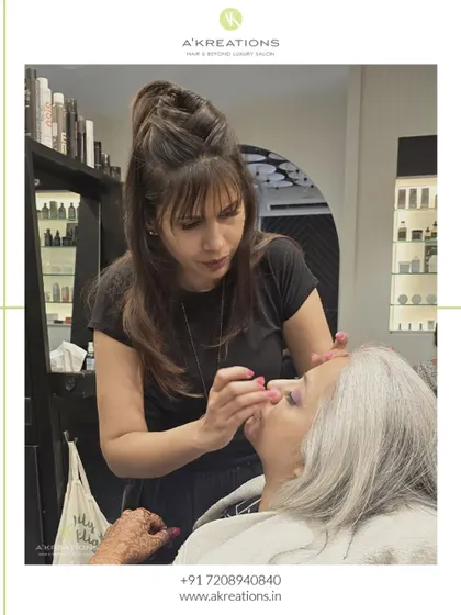 Our creative director working her magic, ensuring every client receives personalized attention and a look that makes them feel their best.