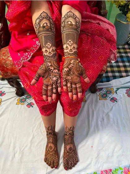 A full bridal set, showing how the designs on the hands and feet can be coordinated for a complete look.
