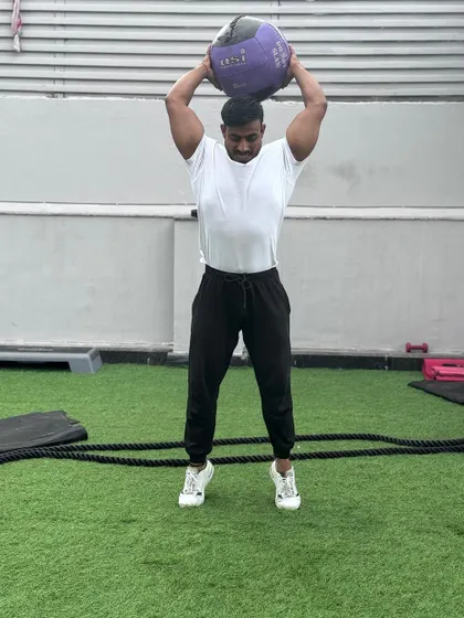 Taking my own advice to live a healthier lifestyle. Here I am doing medicine ball slams, a great exercise for developing full-body power.
