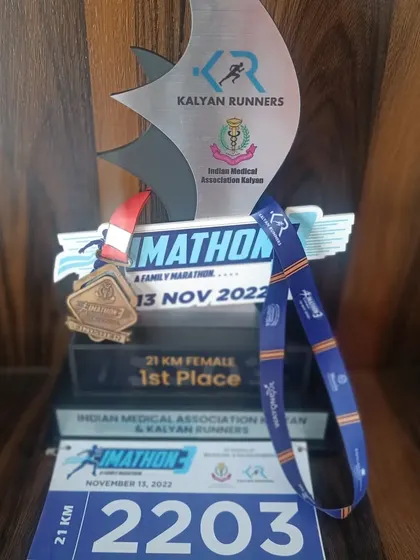 The trophy and medal from the Kalyan Half Marathon. A reminder of a strong comeback and a race well run.