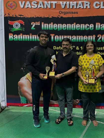 Harsh and Bharathi, the A Group Mixed Doubles winners, celebrating their victory.
