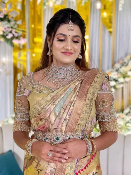 Another beautiful shot of the bride. The intricate details of her jewelry and the embroidery on her blouse are simply breathtaking.