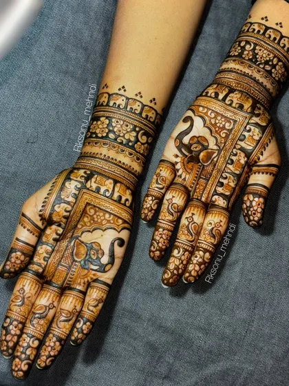 Here is a collection of my intricate bridal and engagement designs. Each one features a unique combination of traditional motifs like elephants, peacocks, lotuses, and personalized elements for the bride.