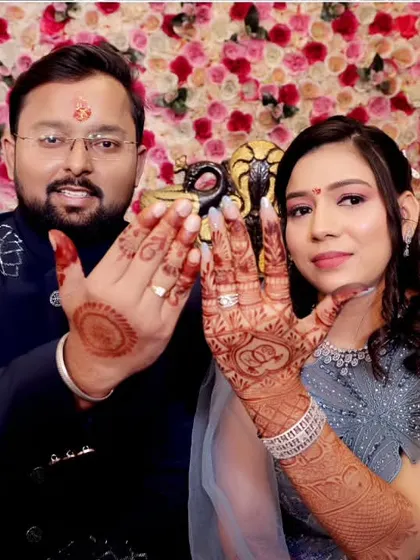 The couple proudly showing off their engagement rings and mehndi. This is a classic shot that we love to capture to celebrate the union.