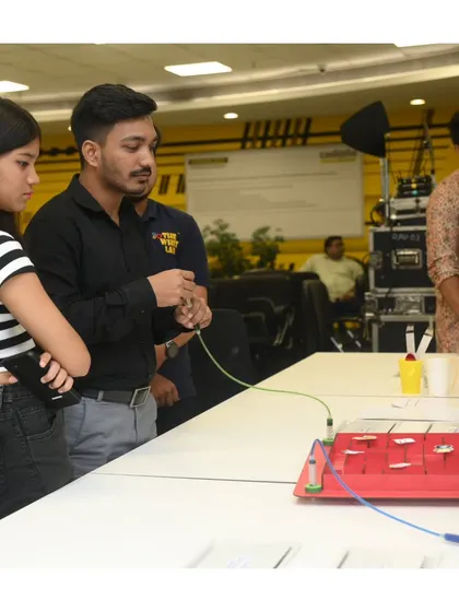 It's not just for kids. Here, adults get competitive, trying their luck at the steady-hand game. It’s a perfect icebreaker and a source of great fun for employees.