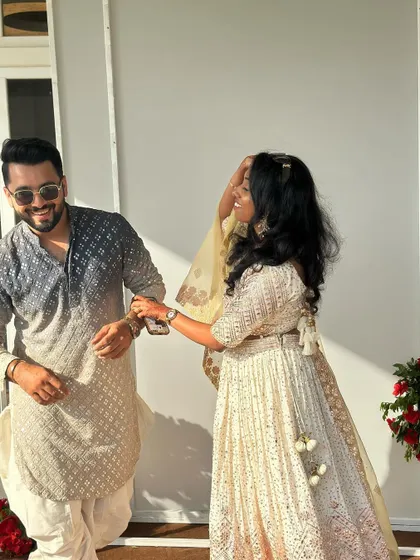 A candid moment with the happy couple during their wedding celebrations. I love capturing these small, joyful interactions that happen off the dance floor.